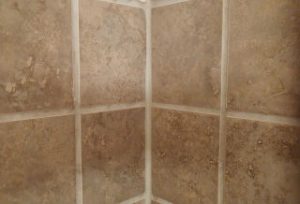 grout on bathroom tile walls